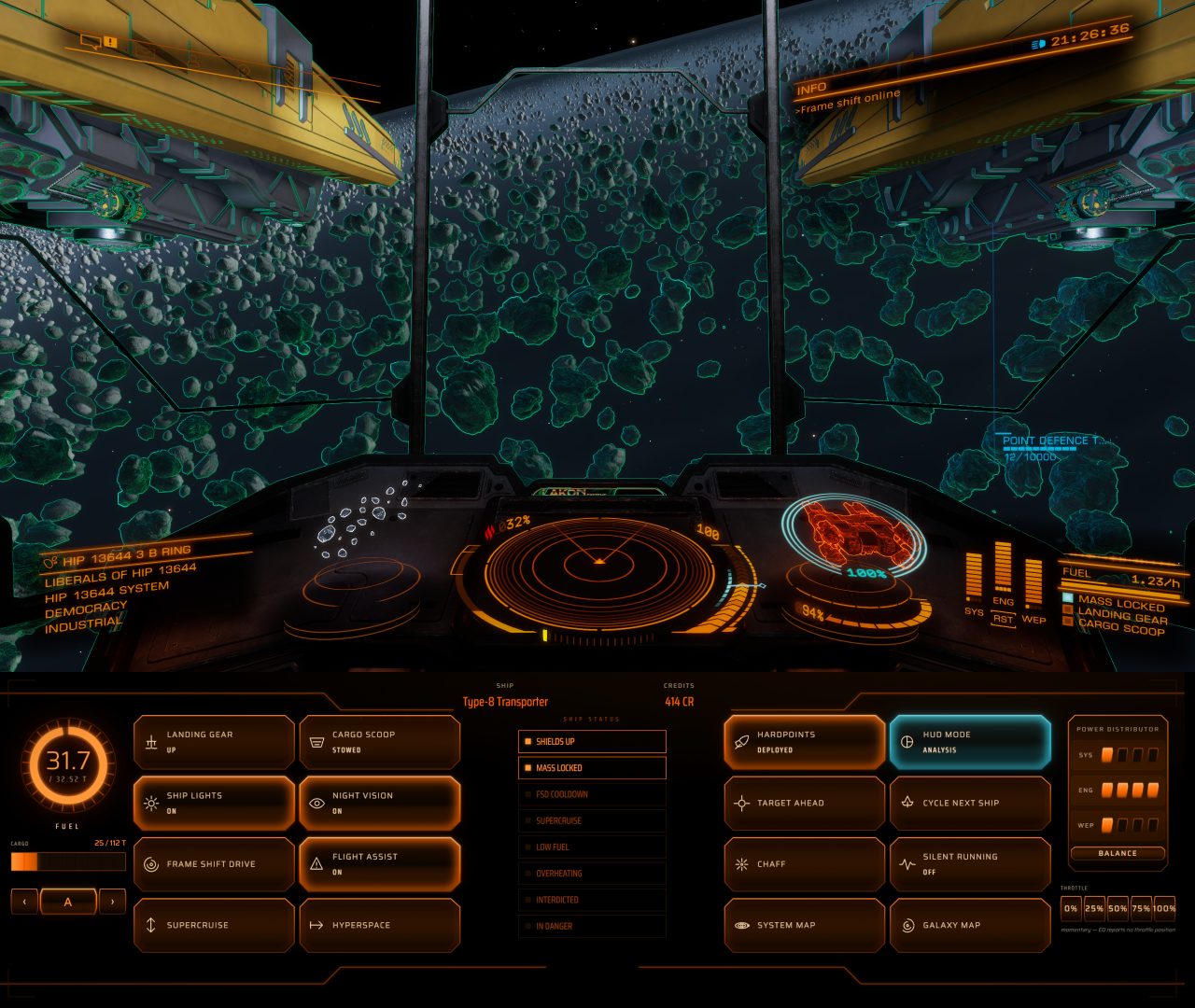 Elite Dangerous running on the main display, with the Facette Elite Dangerous Face on a second display below it showing fuel, cargo, credits, ship status indicators, power distribution, and game-specific controls